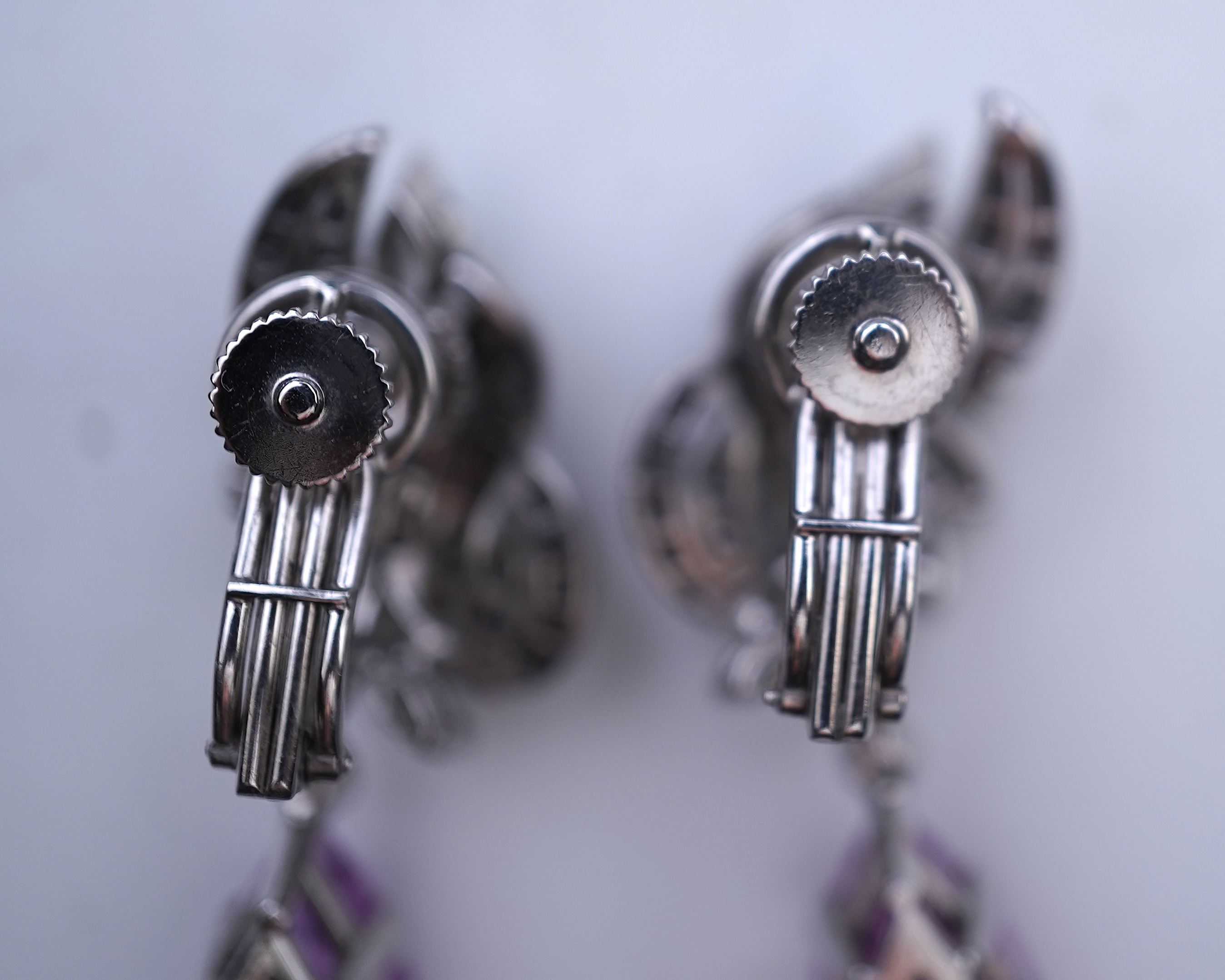 An attractive pair of 'day and night' kunzite and diamond ear clips